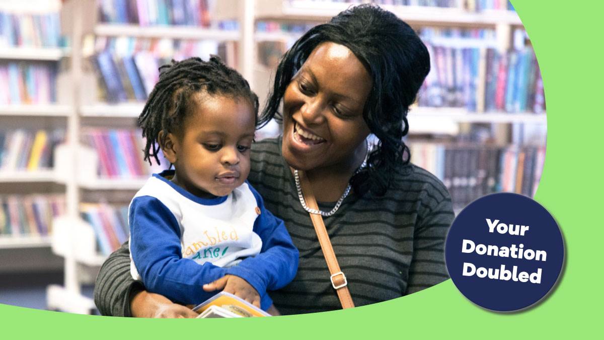 A photo of a woman and a child looking at a book in a library plus the words "Your donation doubled"